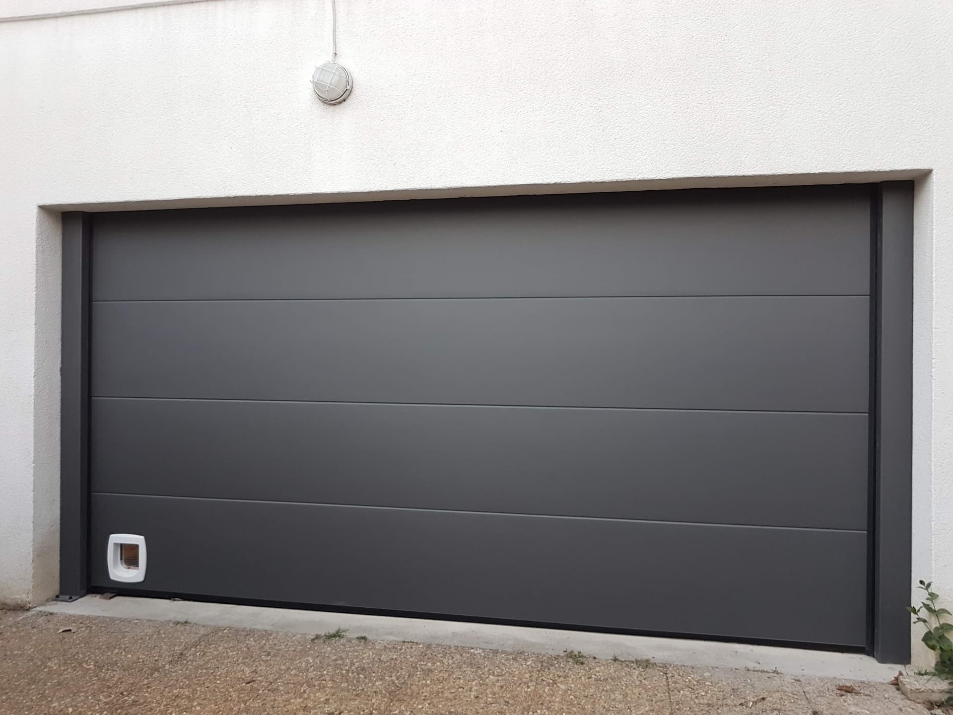 Porte de garage sectionnelle Lyon 5 metres THERA Fermetures